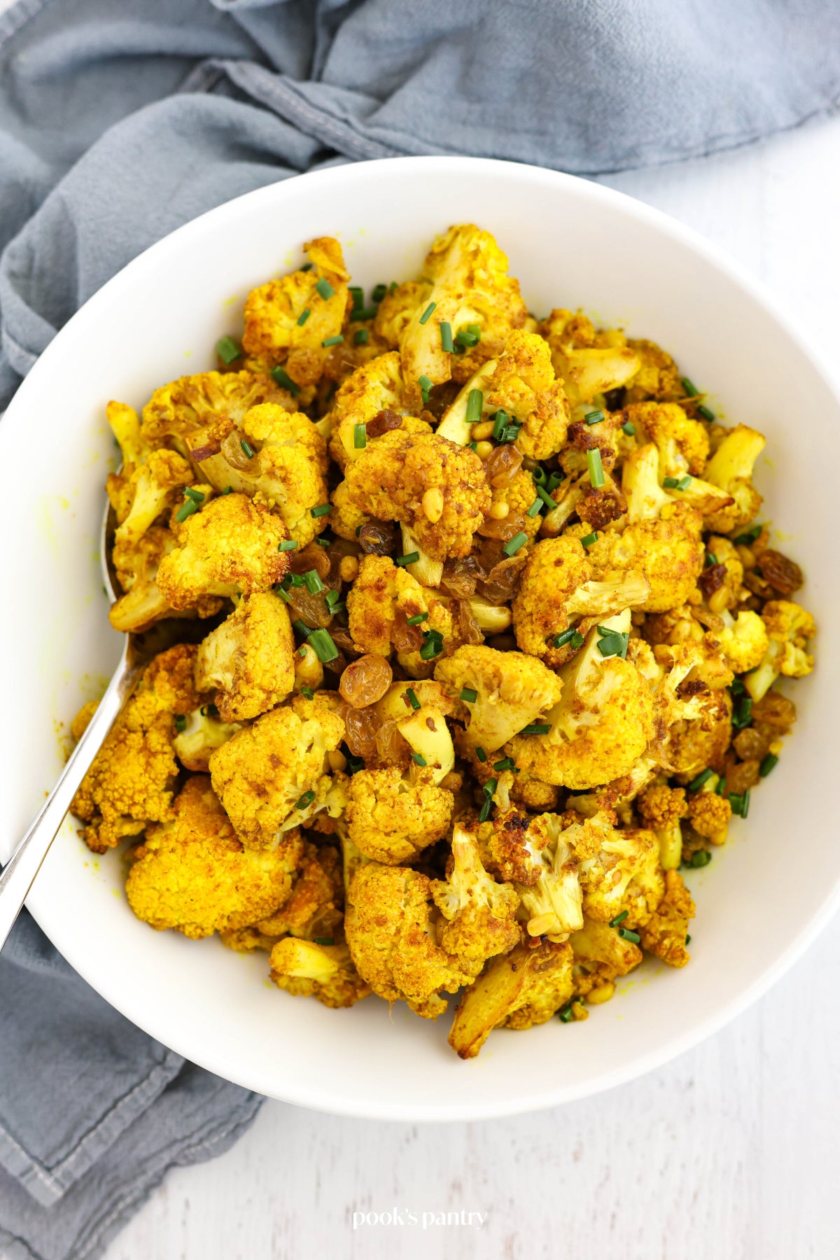 Curried Cauliflower with Golden Raisins & Almonds